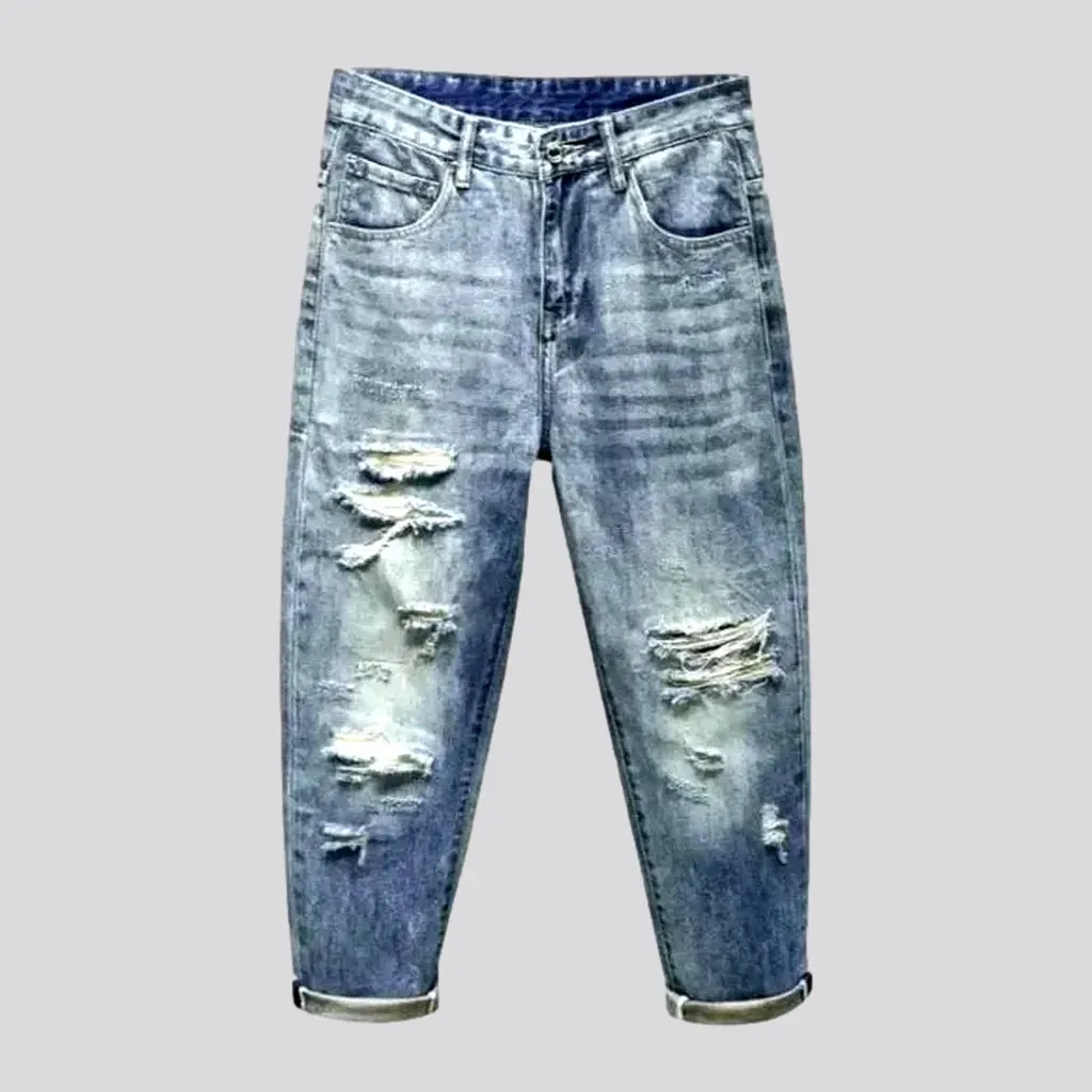 Medium-wash men's grunge jeans