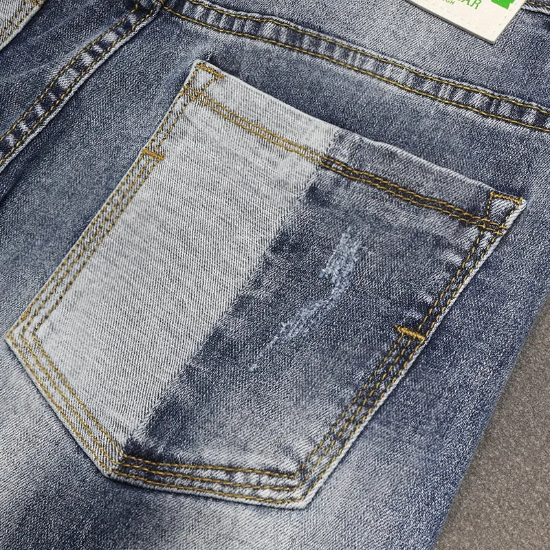 Ripped Patchwork Denim Jeans