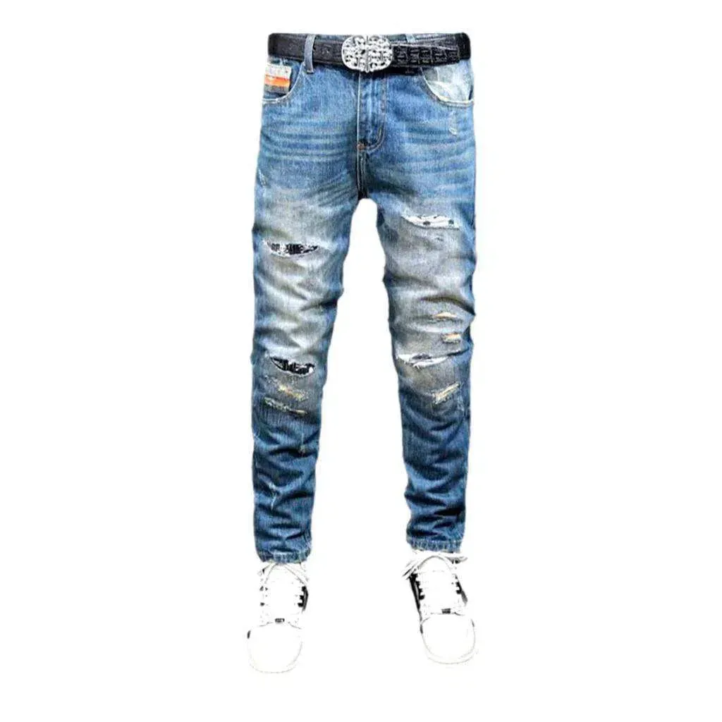 Small skulls embroidery jeans
 for men