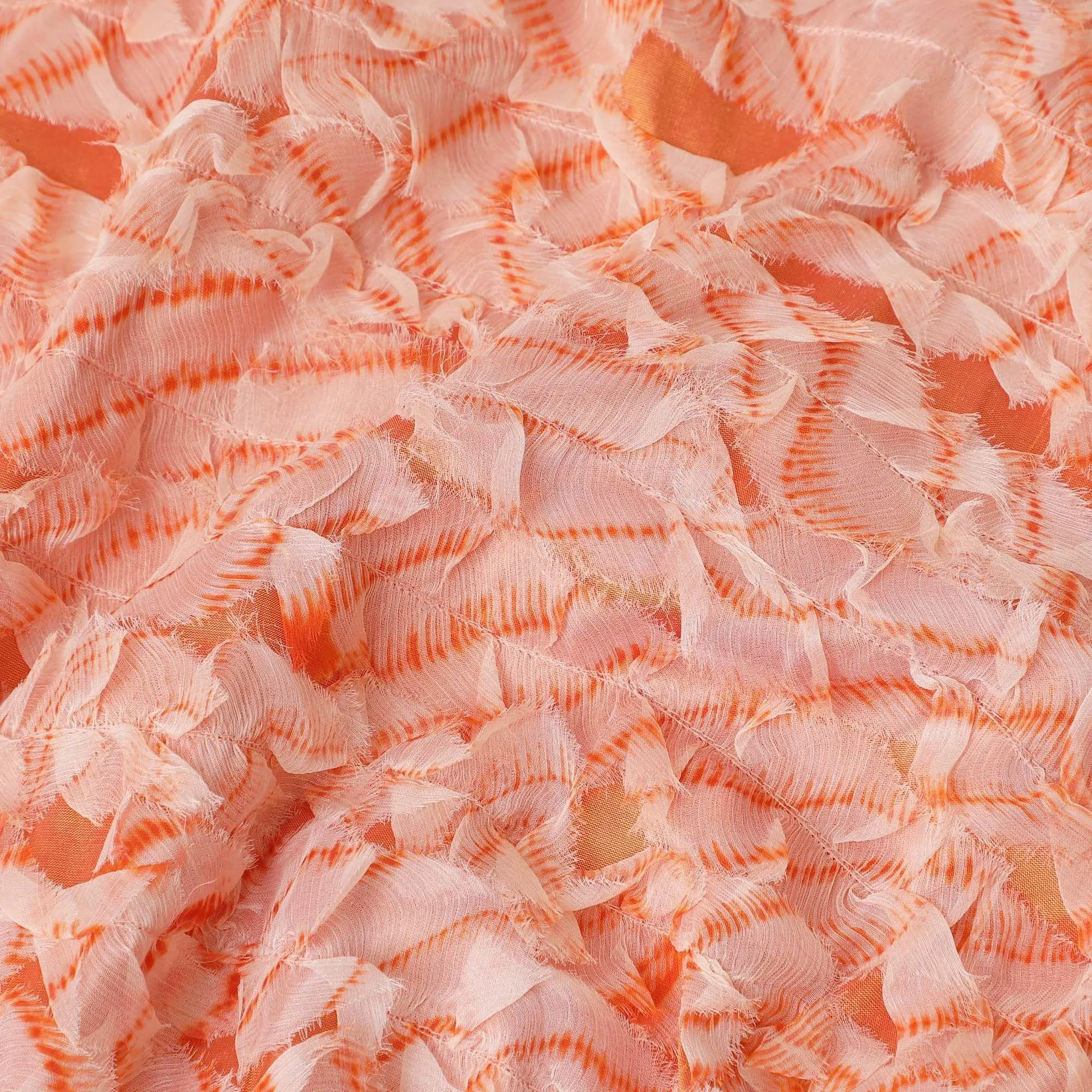 Squash orange synthetic chiffon fabric with off white and same tone patchwork in fancy design-D11669